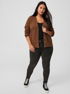 FIT Model is 5'8” wearing size 1. . Measures 24” from shoulder (size 2). . MATERIALS + CARE Vegan Cashmere fabric: A luxe, cashmere-like brushed fabric with a soft, cozy feel that’s never heavy. So easy to dress up or down. . Stretch level: Medium. . 26% acrylic, 24% polyester, 33% recycled polyester, 14% nylon, 3% spandex. . Machine wash cold. Line dry. . Imported. . DETAILS Button front. . Long sleeves. V-shaped neckline. The best plus size women's vegan cashmere cardigan v-neck drop shoulder sweater cardigans in potting soil made of vegancashmere. Torrid is your destination for cozy fall and winter clothes to keep you warm and comfortable. Plus Size Comfy, Cozy Clothing, Drop Shoulder Sweater, New Street Style, Cashmere Fabric, Brown Cardigan, Comfy Clothes, Comfortable Sweater, Drop Shoulder Sweaters