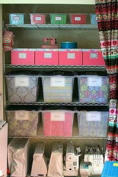 the sewing room is organized and ready to be used as a storage area for crafting supplies