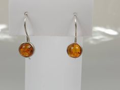 Gorgeous, Small Natural Baltic Amber 925 Sterling Silver earrings feature Amber, attached to Sterling Silver setting with 925 Sterling silver lever backs. Details: Brand New earrings https://www.etsy.com/shop/AmberLithuania?ref=simple-shop-header-name&listing_id=780205095&section_id=27948198 Tree Of Life Earrings, Multicolor Earrings, New Earrings, Amber Earrings, Earring Gold, Sterling Silver Jewellery, Amber Necklace, Amber Beads, Jewelry Birthday