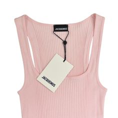 Jacquemus 'Le Debardeur Caracao' tank top in light pink. Features ribbed cotton material and a scoop neckline. Includes dustbag. Brand = Jacquemus Condition = 10/10, new with tags Size = Women's Medium Material = 100% Cotton SKU = 5144-228 Pink M, Scoop Neckline, Cotton Material, Light Pink, Tank Top, Tank Tops, Bra, Tags, Pink