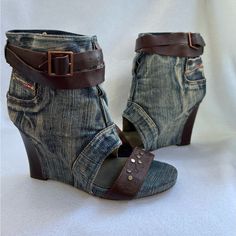 Diesel Has Long Been A Leading Pioneer In Denim And Casual Fashion, Known For Moving Outside And Ahead Of Trends In Its Industry. Slip On The Diesel Heureux Boot And Find Some Denim That Hugs You In All The Right Places. The Fabric Upper Looks As If It's Artfully Constructed Out Of A Pair Of Jeans, With A Sparkling Strap Over The Foot And A Double Strap Around The Ankle. The Covered Wedge Features A Bit Of The Same Leather Trim Behind The Heel, Making This A Bootie That Will Look Foxy From Every Diesel Shoes, Denim Heels, Diesel Denim, Dark Circles Under Eyes, Denim Boots, All The Right Places, Denim Design, Trendy Shoes, Summer 24