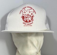 Trucker style hat - white hat featuring Lady Luck Casino Hotel Mad Money , Downtown Las Vegas  Has a couple of pin holes for your lucky pins to be attached to the brim! This hat has clearly been infused with good luck. Casino Night Hat, Mad Money, Lady Luck, Casino Hotel, Downtown Las Vegas, Vintage Lady, Las Vegas Hotels, White Hat, Fort Worth