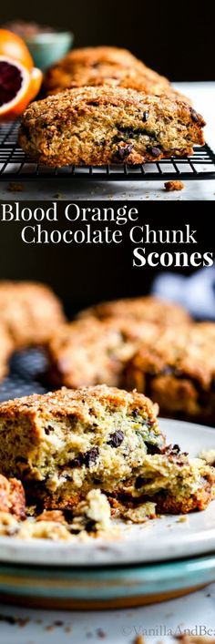 two plates with cookies and oranges on them, one has chocolate chunk scones