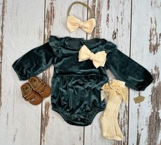 This adorable soft velvet green romper has buttons on the back and is stretchy.  It is made of 65% cotton, 35% polyester fabric. Beautiful bow is attached to romper with an alligator clip and can be removed for wash or to wear elsewhere. This set includes your choice of the full set shown in the photo or any combo of the following pieces: romper, headband, socks, and shoes.   Romper has snaps around legs for easy diaper changes and buttons on the back.   Perfect outfit for birthday, baptism, Eas December Newborn Outfits, Christmas Baby Outfits Girl, Newborn Holiday Outfits, Newborn Girl Christmas Outfit, Baby Sweater Romper Christmas, Christmas Romper, Monogram Outfit, Baby Girl Christmas, Matching Headband