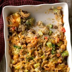 a casserole dish with meat and vegetables in it