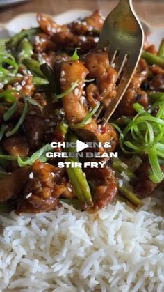 chicken and green bean stir fry with rice on a plate, ready to be eaten