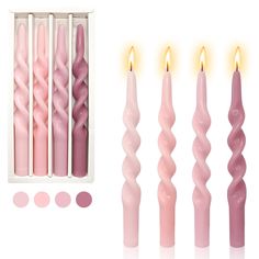 pink candles are lined up next to each other