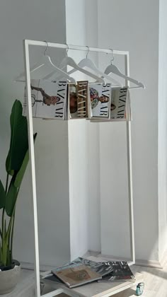 there is a white rack with magazines on it