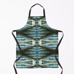 an apron with a blue and green design on it