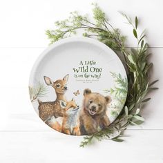 a little wild one is on the way paper plate with woodland animals and greenery