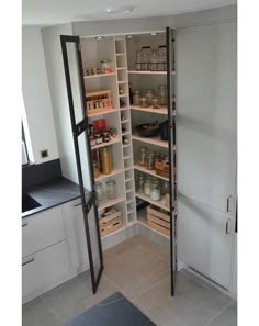 an open pantry with lots of food in it