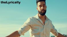 a man with a beard and white shirt standing in front of a blue sky holding his hands out