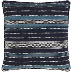 a blue and white striped pillow with fringes on the front, in an ornate pattern