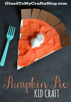 a paper plate that has a pumpkin pie on it and a fork next to it