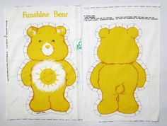 two pieces of cut out paper with teddy bears on them, one is yellow and the other is white