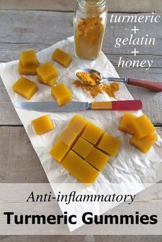 an image of tumericic gummies on a cutting board with honey in the background