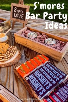 a table topped with lots of different types of snacks and desserts on top of it