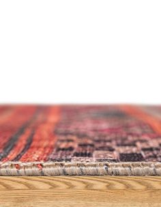 an area rug on top of a wooden table