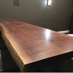 a large wooden table in an office setting