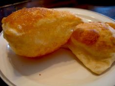 two pieces of food on a white plate