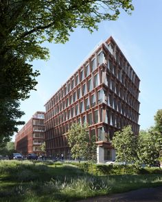 an architectural rendering of a building in the middle of a grassy area with lots of trees