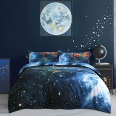 a bed room with a neatly made bed next to a night sky painting on the wall