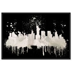 a black and white cityscape with paint splatters