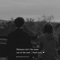 two people sitting on a bench looking at the sky with a quote above them that reads distance isn't the issue coz in the end, i have you