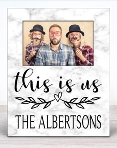 This personalized 'This is Us' picture frame makes the perfect gift from any family! Personalize the frame with their last name, making a truly a unique keepsake!

The graphic is a faux marble effect, professionally and permanently printed on the frame.

These personalized photo frames are 8" x 10" and holds a 4" x 6" photograph. It also includes protective glass and an easel for an easy and classic display. Classic Display, Family Photo Frame, Family Photo Frames, Personalized Photo Frames, Faux Marble