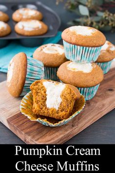 pumpkin cream cheese muffins on a cutting board