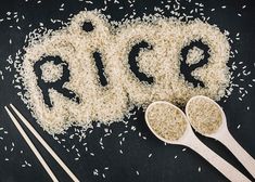 rice and spoons on a black surface with the word 2019 spelled out