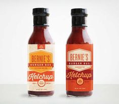 two bottles of ketchup sit side by side