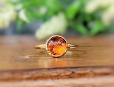 CUT-OFF DATE TO RECEIVE YOUR ORDER BY CHRISTMAS: Sunday December 10th, 2023 All orders received AFTER December 10th will be created and shipped after the Christmas Holidays. Nature Lovers will fall for this stunning Baltic Amber ring ! ❣  Our Honey color ring features a natural round Baltic amber stone - uniquely handcrafted by electroforming on a 14k Gold filled band plated in 18k Gold. This lovely Statement ring will be sure to make a perfect gift for any special occasions such as Birthday, An Round Cut Citrine Jewelry For Gifts, Citrine Birthstone Rings As Gift, Gold Crystal Ring With Bezel Setting As Gift, Amber Birthstone Ring With Gemstone Details As Gift, Amber Birthstone Ring Gift, Amber Gemstone Birthstone Ring Gift, Round Citrine Jewelry Gift, Citrine Jewelry Gift With Round Shape, Citrine Jewelry Gift Round Shape