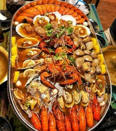 a large platter filled with lots of seafood