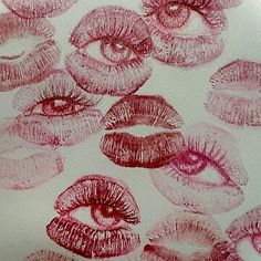 a bunch of lipstick drawn on top of a piece of paper