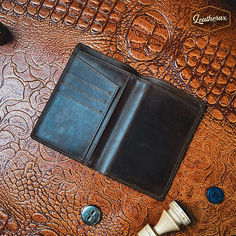 A high-quality leather passport holder that protects your passport and adds a touch of style to your travels. Passport Wallet