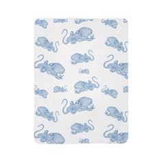 a blue and white towel with elephants on it