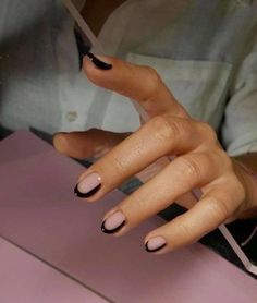 Add edgy vibes to your look with a black outline French manicure. To recreate this design, prolong the line from the tips to one of the sides. This idea is easy to DIY, yet will set your tips apart. Save Share via: 203.7K Shares 213 1 203.5K More Paznokcie Hello Kitty, Nagellack Trends, Minimalist Nail Art, Nagel Tips, Minimal Nails, Makijaż Smokey Eye, Nail Swag