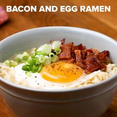 bacon and egg ramen in a white bowl on a wooden table with text overlay