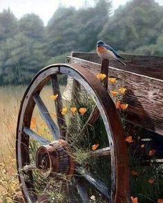 a painting of a bird sitting on top of a wooden wagon with flowers growing out of it