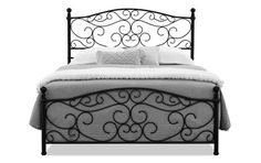 a black metal bed frame with white sheets and pillows on top of it, against a white background