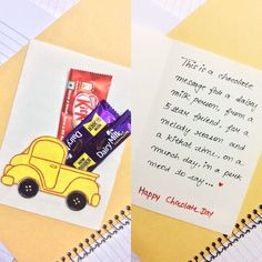 a note is attached to a yellow car with chocolate bars on it, next to a notepad