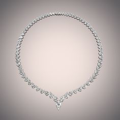 Embody the essence of empowerment with this pear-cut diamond eternity necklace. Designed elegantly with a continuous line of carefully chosen diamonds, each bearing a lovely silhouette similar to a droplet. The pear-cut diamonds gently taper in size as they move to the clasp. Indulgent and remarkable, you can expect a magnificent light performance from this stunning jewel. Pear Cut Diamond Necklace, Eternity Necklace, Pear Cut Diamond, Continuous Line, Teardrop Necklace, Pear Diamond, Diamond Eternity, Custom Engagement Ring, Pear Cut