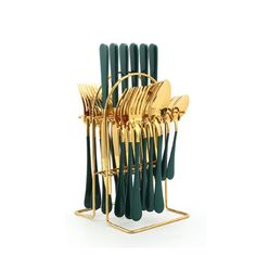 gold and green utensils are arranged in a holder on a white background with clippings