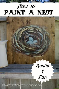 a wooden pallet with the words how to paint a nest on it and an image of a bird's nest