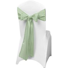 a white chair with a green bow tied to it's back and seat cover