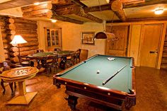 a pool table in the middle of a room