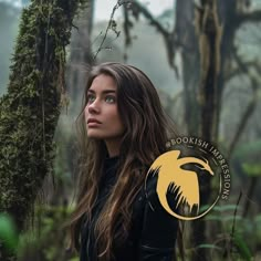 a woman with long hair standing in front of some trees and mossy branches, looking into the distance