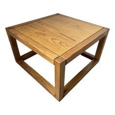 a square wooden table with two legs