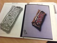 an open book with two pictures of chocolate bars on it and the same one in color